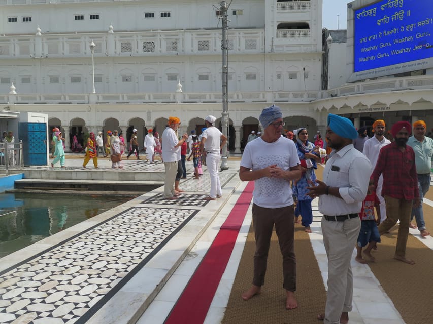Amritsar: Golden Temple, Jallianwala Bagh, Wagah Border Tour - The Golden Temple, where service is part of the visit