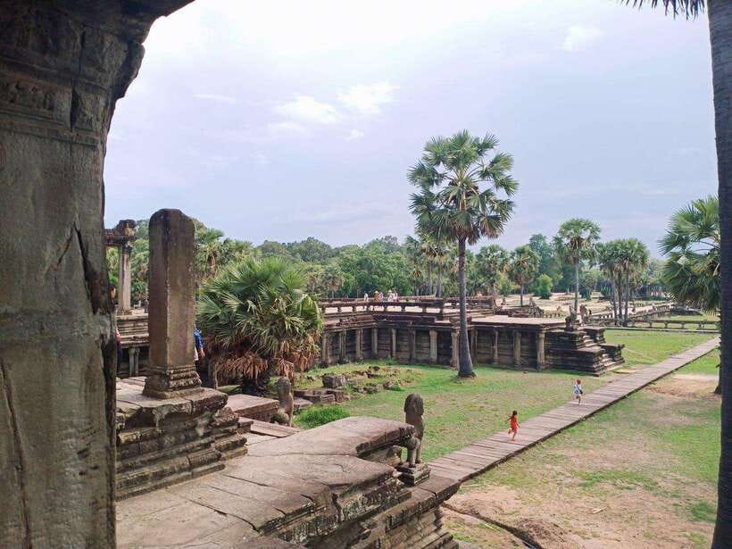 Angkor Wat, Angkor Thom, and Ta Prohm Day Trip with Sunset - Ta Prohm, where stone meets the trees