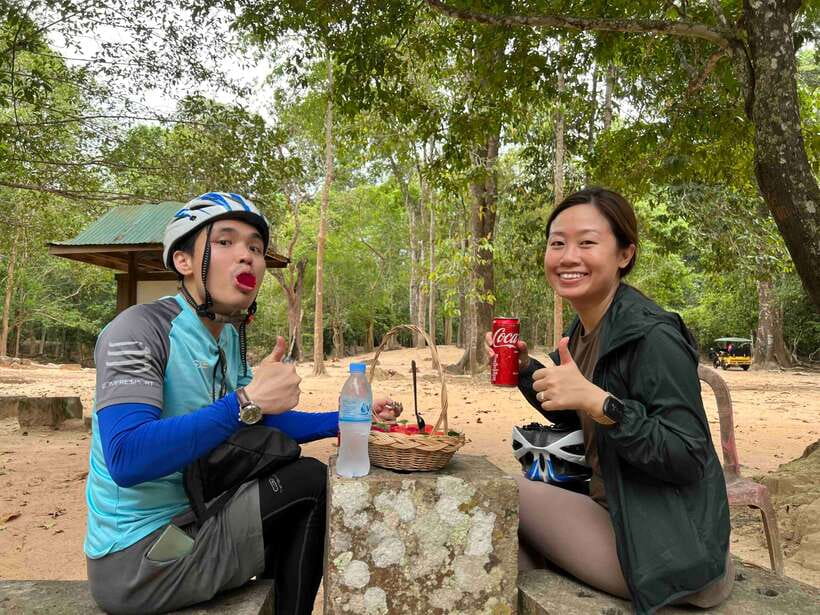 Angkor Wat Sunrise Bike Tour With Lunch Included - South Gate and Bayon’s stone faces