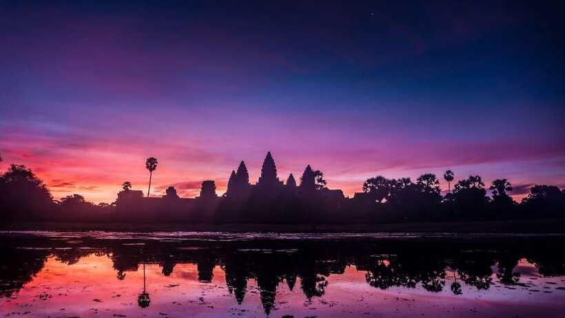 Angkor Wat: Sunrise: Ta Prohm and Bayon Temple Tour - Bayon, Angkor Thom, and a city of stone faces
