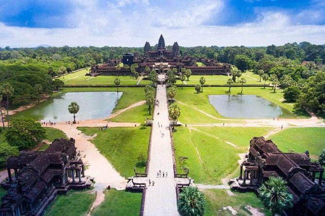 Angkor Wat Sunrise Tour - Ta Prohm, where trees and stone share the frame