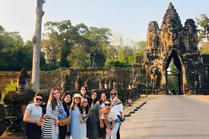 Angkor Wat Sunset Small Group Tour with Lunch Included - Bayon’s stone faces change the mood