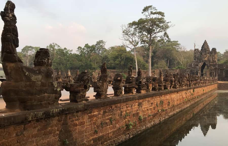 Angkor Wat & Temples: Private Spiritual Tour by Lady Tuk Tuk - Entering Angkor Thom through the South Gate