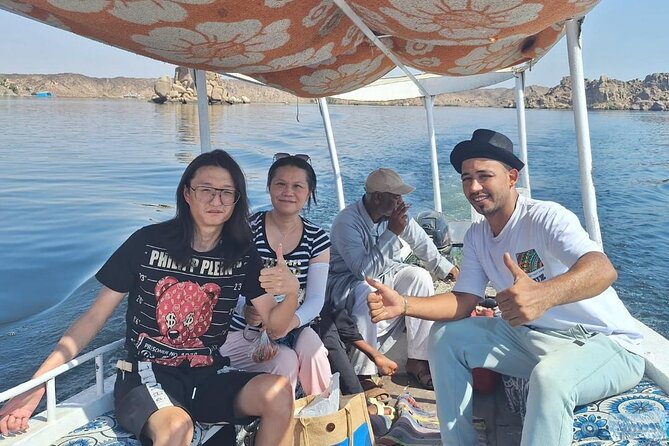 Aswan Day Tour: Philae Temple, Obelisk, High Dam & Nubian Village - Reading the granite at the Unfinished Obelisk