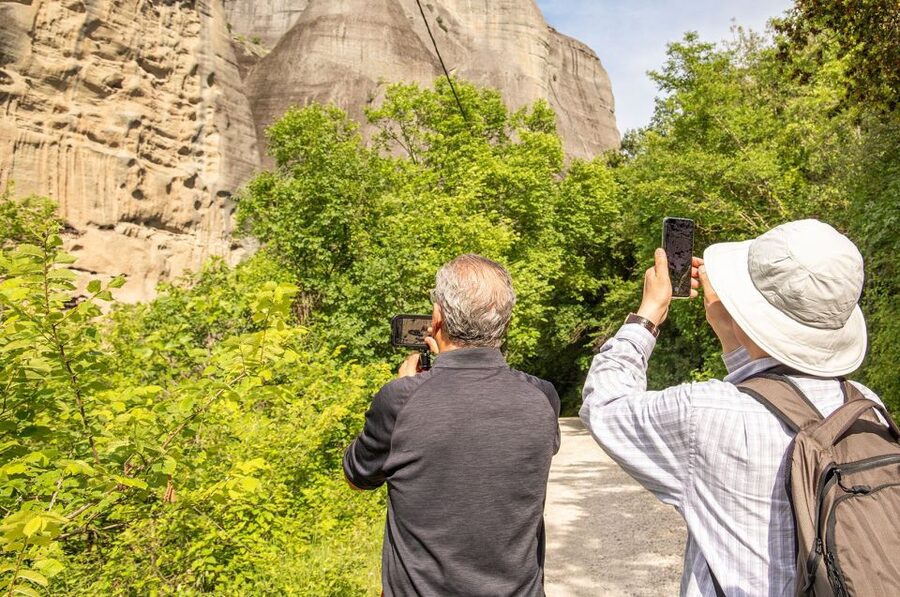 Athens to Meteora: Monasteries & Hidden Caves Bus Tour - Arriving at Kalambaka and switching to the local minibus