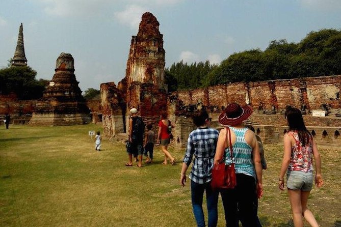 Ayutthaya UNESCO Temples Group Tour with Lunch - Wat Mahathat and the Buddha head in the tree