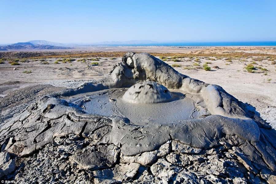 Baku:Gobustan Mud Volcanoes Temple & Entry tickets included - Yanar Dag: flames on the hillside