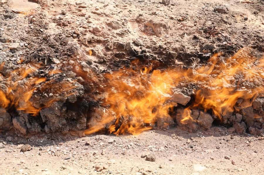 Baku: Gobustan, Volcanoes, Fire Temple and Yanardag Day Trip - Yanardag and the burning hillside