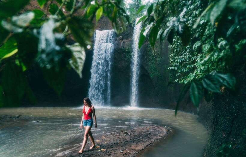 Bali: Ubud Tour with Tirta Empul Temple and Rice Terrace - Tibumana Waterfall: calmer scenery and another swim