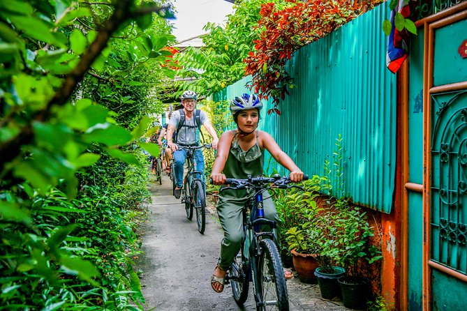 Bangkok: Backstreets and Temple Historic Bike Tour - Crossing Rama VIII Bridge for a city view