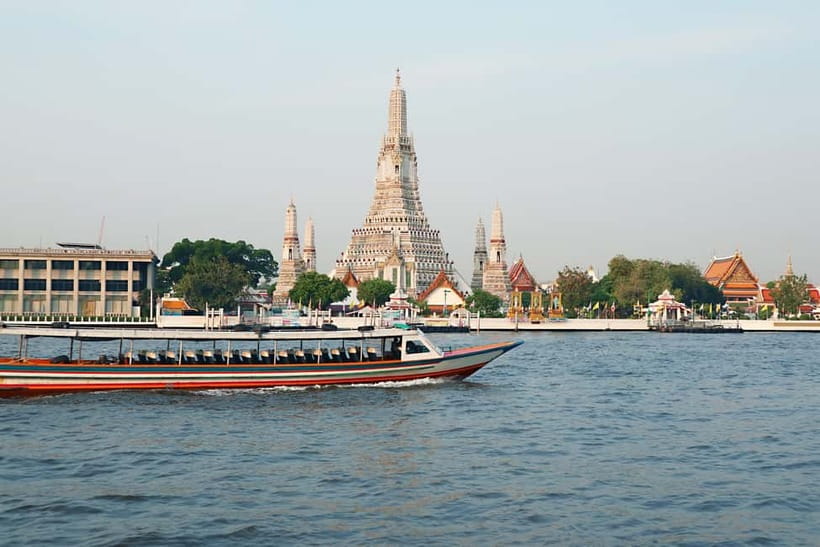 Bangkok: Canal Tour, River Local Life & Wat Arun Guide Visit - What the teak boat adds to the experience