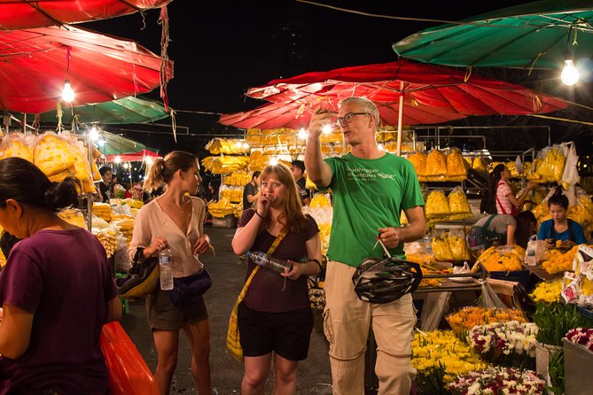Bangkok: Night Bike Tour with Temples & Flower Market Visit - The Chao Phraya ferry at sunset
