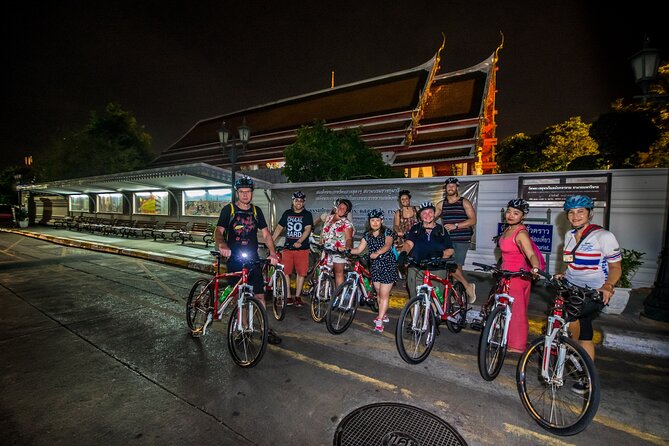 Bangkok: Night Bike Tour with Temples & Flower Market Visit - Wat Rakang and the quieter riverside lanes