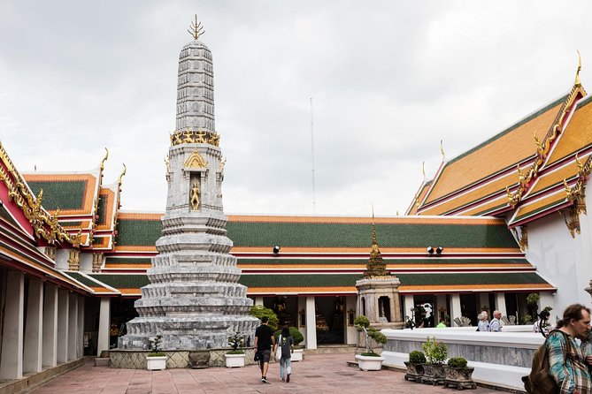 Bangkok Reclining Buddha (Wat Pho) Entrance Ticket - Massage, wishes, and small human details