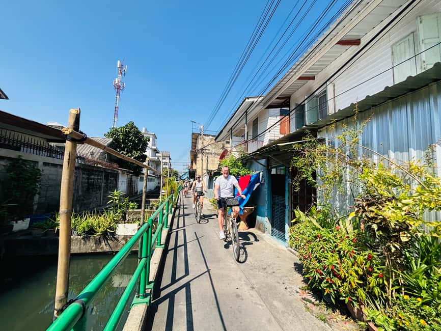 Bangkok: Temples, Canals & Local Life Bike Tour - How the Guides Shape the Experience