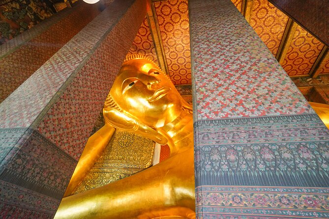 Bangkok Wat Pho and Flower Market Historical Walking Tour - Why the Thai costume makes Wat Arun more memorable