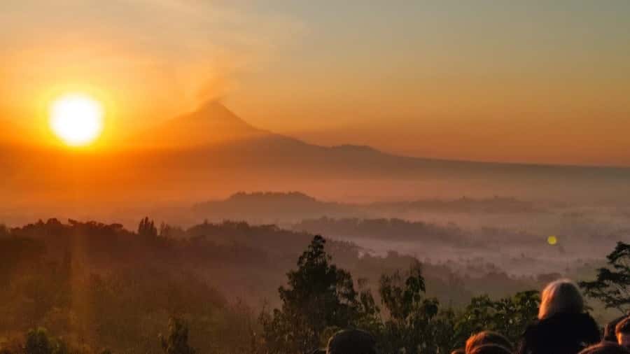Borobudur Sunrise in stumbu hill, Borobudur, & Mendut temple - Mendut Temple and its giant stone Buddha