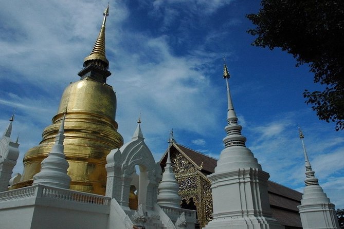 Chiang Mai: Guided City & Temple Discovery with Hotel Pickup - Hotel pickup, group size, and extra charges