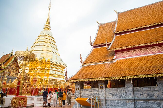 Doi Suthep and Wat Pha Lat Sunrise Private Tour – Half Day - Climbing the 306 steps at Wat Phra That Doi Suthep