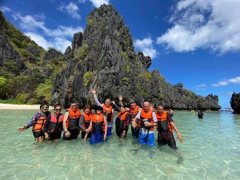 El Nido: Tour C with Matinloc Shrine and white sand beaches - Secret Beach and the fun of getting ashore