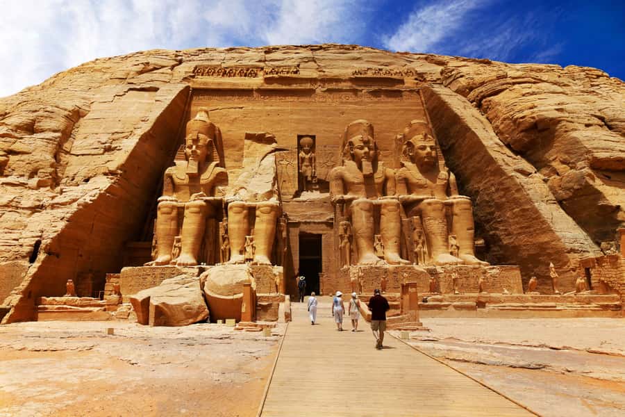 From Aswan: Abu Simbel Temple Day Trip with Hotel Pickup - First view: the great façade of Ramesses II