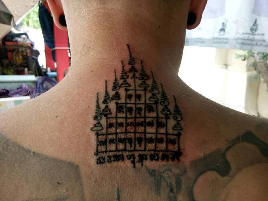 From Bangkok: Holy Tattoo Experience at Wat Bang Phra - Choosing a design and understanding the offering