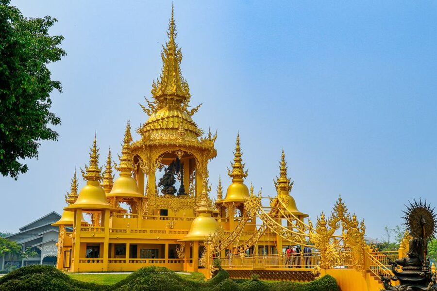 From Chiang Mai: Chiang Rai 2 Temples and Golden Triangle - The Black House adds a darker artistic note