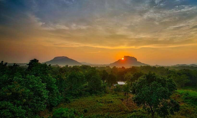 From Colombo: Sigiriya Rock Sunrise Climb with Dambulla … - Sunrise above the North Central Province