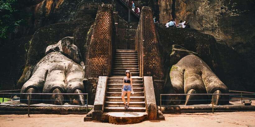 From Negombo: Sigiriya and Dambulla Day Trip and Safari - Dambulla’s painted caves before the worship closure