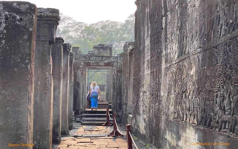 From Phnom Penh: Angkor Wat, Bayon, and Ta Prohm Day Trip - Bayon and the smiling stone faces