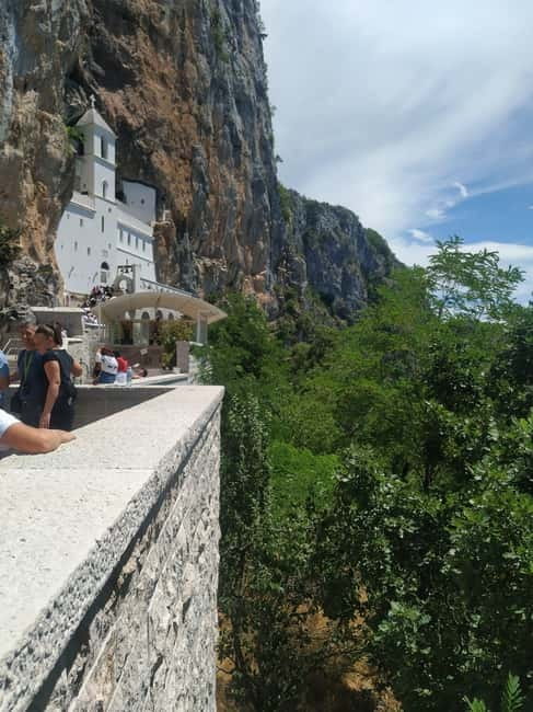 From Podgorica: Ostrog Monastery Tour with Pick Up - Entering the Upper Monastery and seeing the frescoes