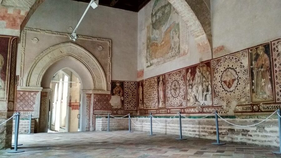 From Seville: Italica Roman City & Medieval Monastery Tour - San Isidoro del Campo, a medieval change of mood