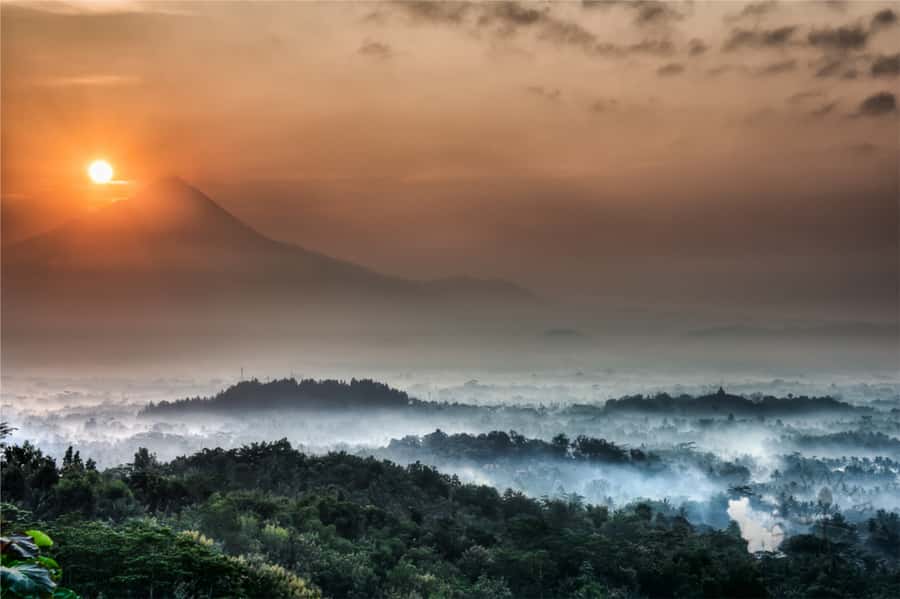 From Yogyakarta: Borobudur Sunrise Half Day Tour with Pickup - Climbing Borobudur with a local guide