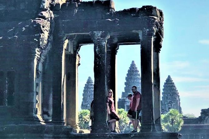 Full-Day Temples of Angkor Small Group Tour - Ta Prohm, where trees press into the ruins
