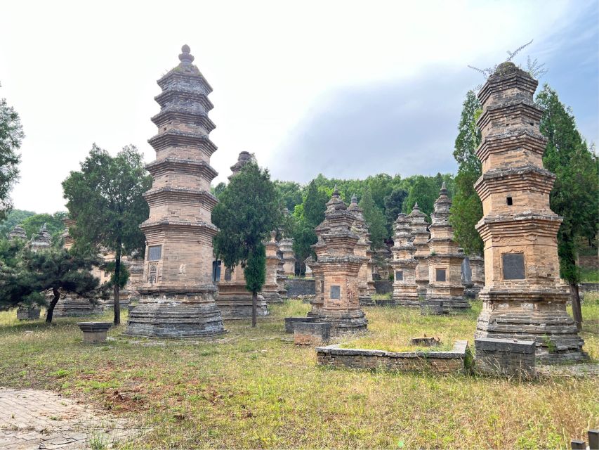 Luoyang Private Day Tour to Shaolin Temple&Longmen Grottoes - The boat cruise for a wider view