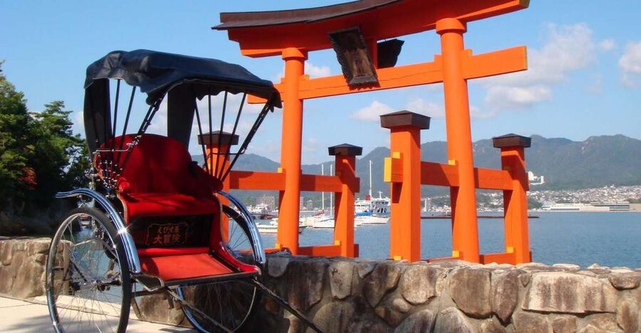Miyajima: Private Rickshaw Tour to Itsukushima Shrine - Through the townhouses and shopping arcade