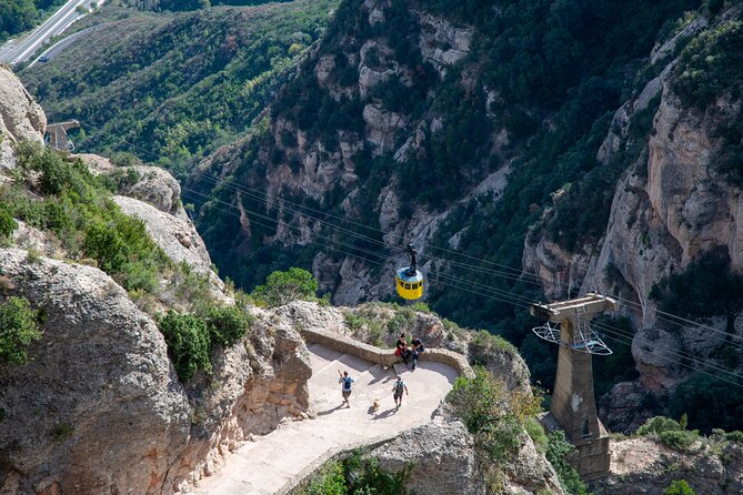 Montserrat Tour with Cogwheel Train, Monastery & Black Madonna - Arriving in Montserrat’s rocky setting