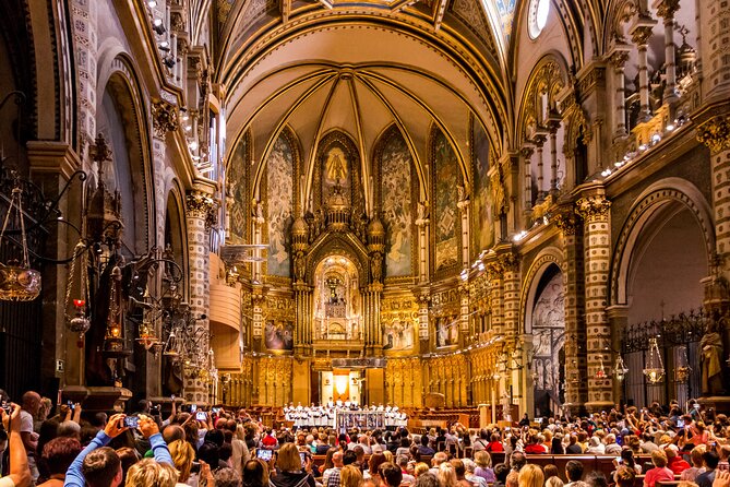 Montserrat Tour with Cogwheel Train, Monastery & Black Madonna - Tasting local liquors and seeing the audio-visual exhibition