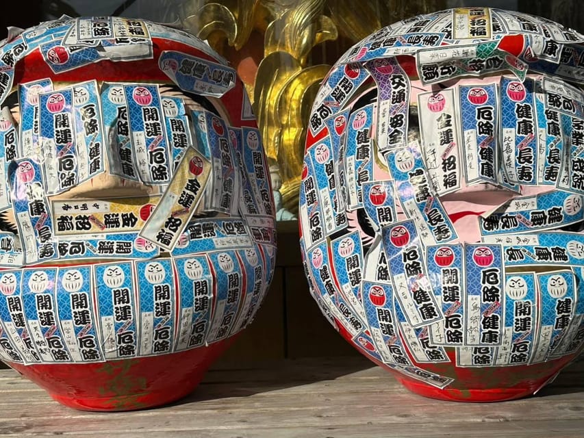 Naha: Guided E-Bike Tour of the 12 Zodiac Temples - Daruma Temple and the meaning behind the red dolls
