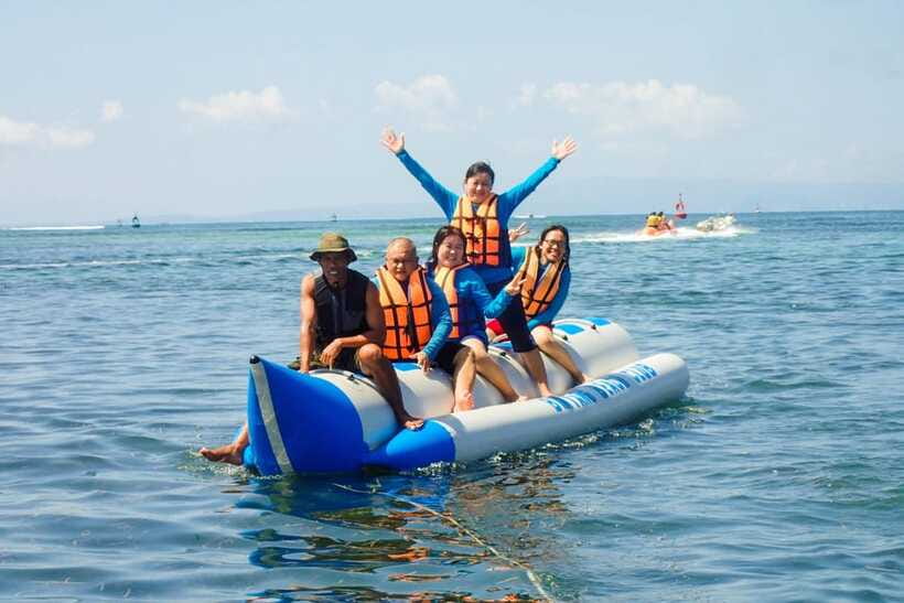 Nusa Dua: Watersports, Uluwatu Temple, and Kecak Dance Tour - Jimbaran Beach seafood after sunset