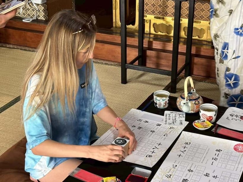 Osaka: Temple Tour and Traditional Calligraphy Lesson - A quiet temple break in central Osaka