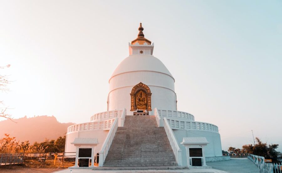 Pokhara: Golden Hour at Peace Pagoda - Himalayan Sunset Tour - Reaching World Peace Pagoda above Fewa Lake