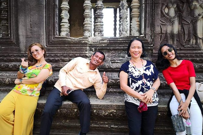 Private sunrise 'small tour' of Angkor Wat with car or van & Guide - Angkor Thom ends with the faces of Bayon