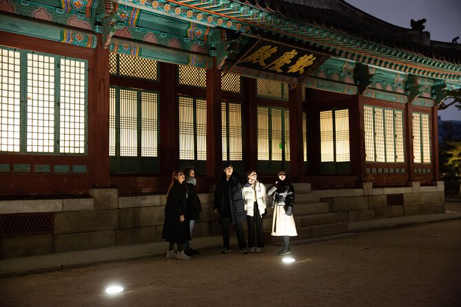 Seoul Night Palace & Market Food Tour with Vehicle - Walking through Seoul between meal and temple