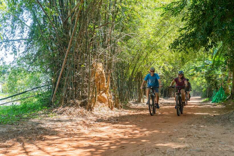 Siem Reap: Angkor Sunrise 2 Days Guided Bike Tour - Day two leaves the monuments behind