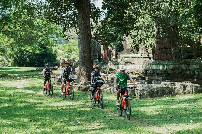 Siem Reap: Angkor Wat Sunrise Bike Tour & Jungle Breakfast - Bayon and the faces of Angkor Thom