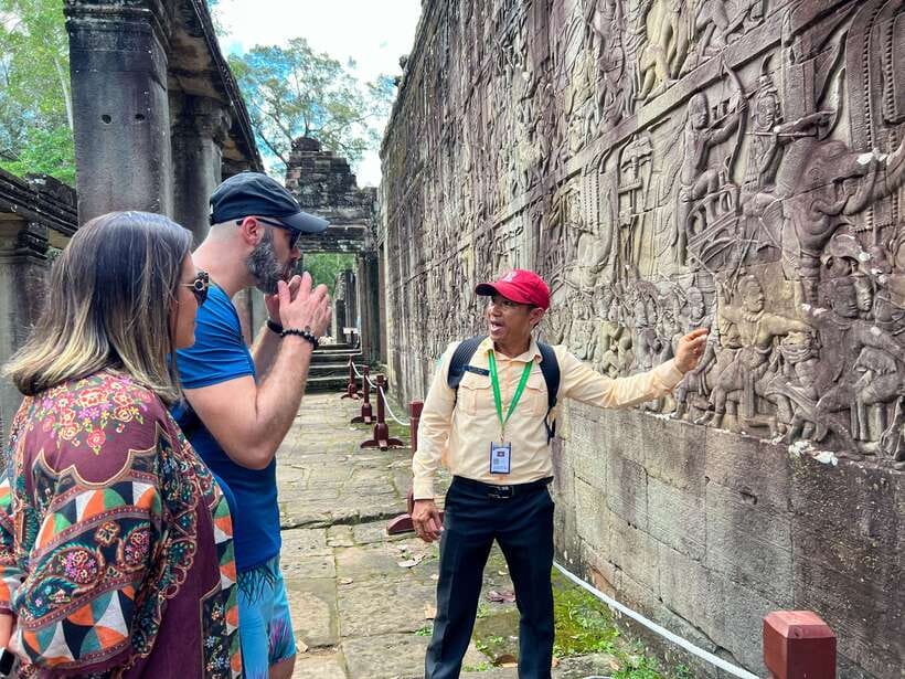 Siem Reap: Angkor Wat Sunrise Tour via Tuk Tuk & Breakfast - Bayon’s smiling faces and Angkor Thom’s Victory Gate