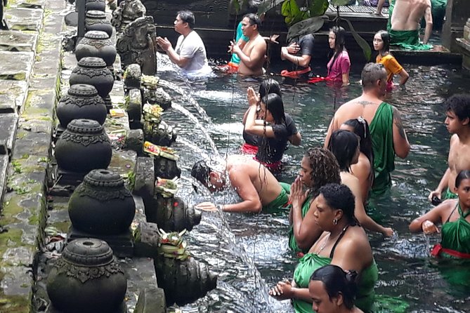 Skip the Line Tirta Empul Temple Entrance Ticket All Inclusive - Walking through the gates and main temple