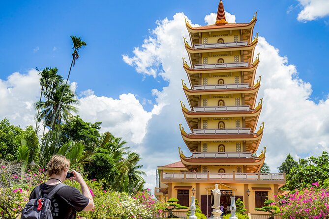 Small-Group Mekong Delta Day Trip: Boat Ride, Cottages & Pagoda - Cruising past My Tho and Rach Mieu Bridge