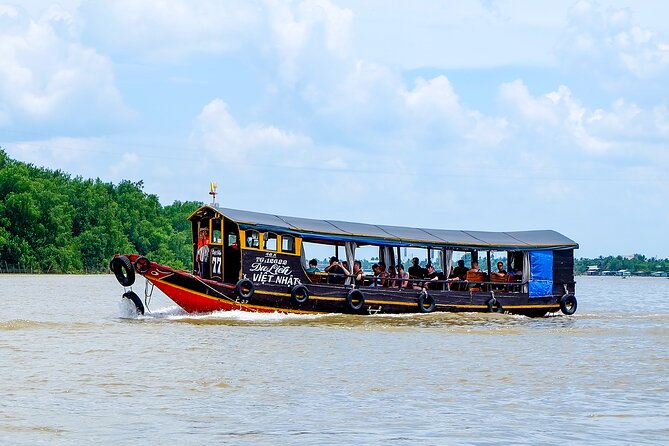 Small-Group Mekong Delta Day Trip: Boat Ride, Cottages & Pagoda - Ben Tre workshops, coconut candy, and honey tea